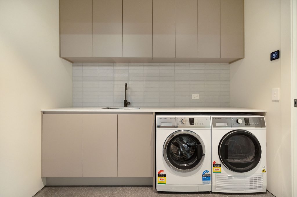 jack's point queenstown fowler homes laundry room 25