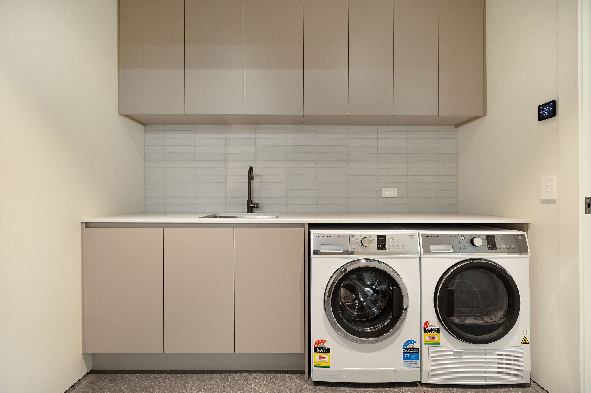 jack's point queenstown fowler homes laundry room 25